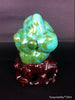 Natural blue turquoise stone with redwood stand 219.6 grams