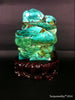 Natural blue turquoise stone with redwood stand 374.6 grams