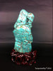 Natural blue turquoise stone with redwood stand 226.2 grams