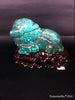 Natural blue turquoise stone with redwood stand 331.0 grams
