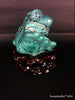 Natural blue turquoise stone with redwood stand 245.4 grams
