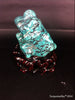 Natural blue turquoise stone with redwood stand 245.4 grams