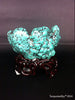 Natural blue turquoise stone with redwood stand 197.4 grams