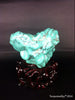 Natural blue turquoise stone with redwood stand 284.6 grams