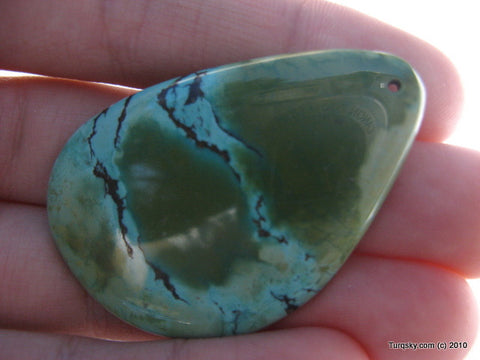 Natural blue turquoise polished pendant 12.3 grams