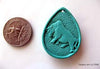 Dual-side hand carved natural turquoise pendant  9.2 grams