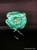 Natural blue turquoise stone with redwood stand 329.4 grams