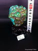 Natural blue turquoise stone with redwood stand 253.6 grams