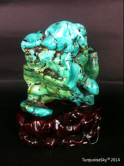 Natural blue turquoise stone with redwood stand 374.6 grams