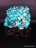Natural blue turquoise stone with redwood stand 549.4 grams