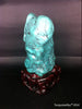 Natural blue turquoise stone with redwood stand 386.2 grams