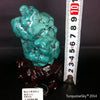 Natural blue turquoise stone with redwood stand 239.4 grams