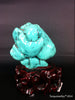 Natural blue turquoise stone with redwood stand 190.6 grams