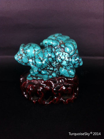 Natural blue turquoise stone with redwood stand 181.4 grams