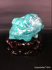 Natural blue turquoise stone with redwood stand 218.2 grams