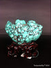 Natural blue turquoise stone with redwood stand 197.4 grams