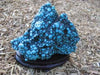 Natural turquoise stone 2.2 pounds with redwood stand