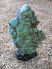 Natural turquoise stone 2.4 pounds with redwood stand